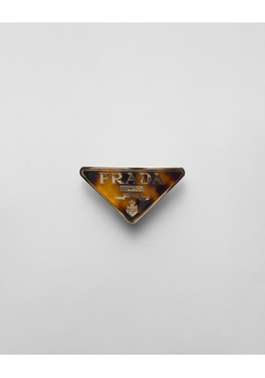 Plexiglas and metal hair clip