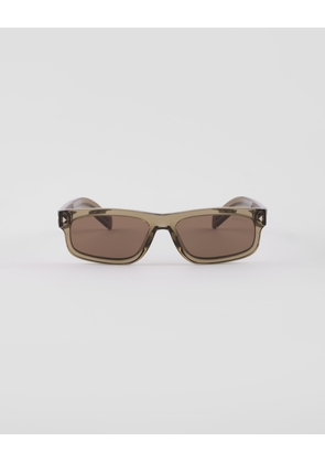 Sunglasses with the iconic metal plaque
