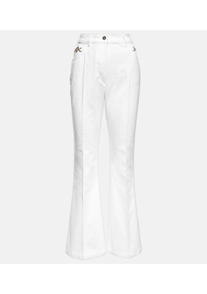 Patou Embellished high-rise flared jeans