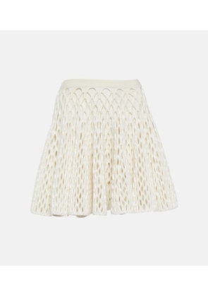 Alaia High-rise knit miniskirt