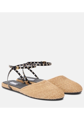Alaia Leather-trimmed raffia flats