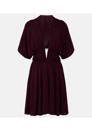 Alaia Gathered open-back minidress