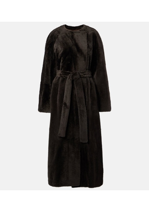The Row Madelina belted shearling coat