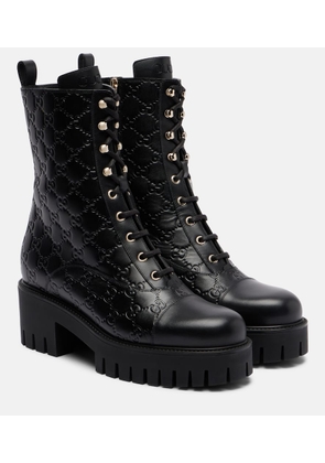 Gucci GG leather lace-up boots
