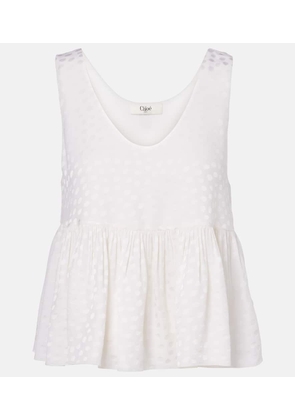 Chloe Polka-dot peplum silk top