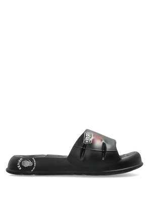 Kenzo Logo Embossed Splash Mules