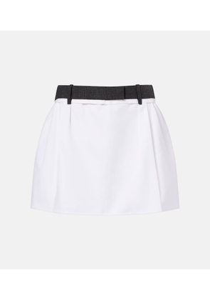Prada Pleated virgin wool-trimmed cotton miniskirt