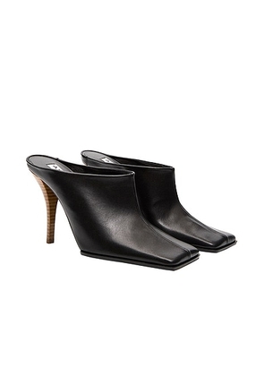 ALAÏA Mule Heel in Noir - Black. Size 39 (also in ).