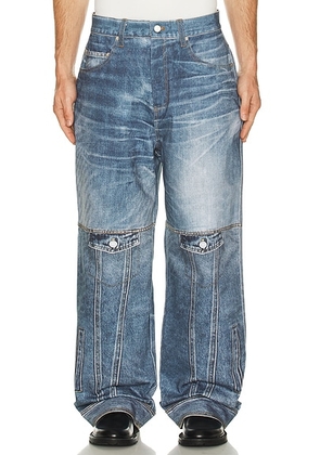 Andersson Bell Custom-Like Printed Denim Pants in Mid Blue - Blue. Size 30 (also in 32, 34, 36).