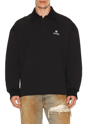 Amiri MA Oversized Long Sleeve Polo in Black - Black. Size L (also in M, S, XL/1X, XXL/2X).