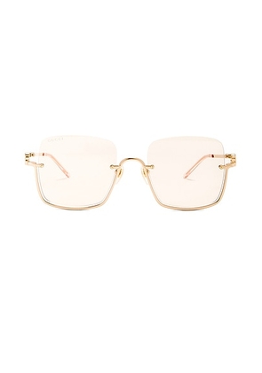 Gucci GG Upside Down Rectangular Sunglasses in Gold & Light Yellow - Metallic Gold. Size all.