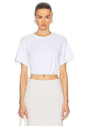 SIMKHAI Jojo Short Sleeve Cropped T-shirt in White - White. Size L (also in ).
