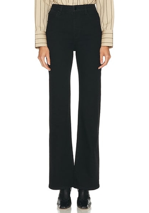 FRAME The Arrow Jeans in Black - Black. Size 24 (also in 27, 29, 30).