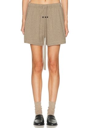 Fear of God ESSENTIALS Soccer Short in Homestead Heather - Grey. Size L (also in XS).