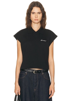 Fear of God ESSENTIALS Cropped Pique Polo Top in Jet Black - Black. Size L (also in S, XS).