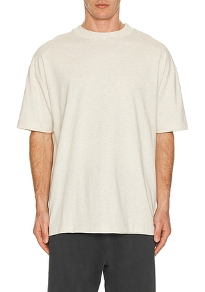 Fear of God ESSENTIALS Classic Short Sleeve Tee in Oatmeal Heather - Grey. Size XS (also in L, M, S, XL/1X, XXL/2X).