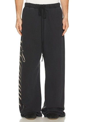Fear of God ESSENTIALS Lounge Sweatpant in Vintage Black - Black. Size L (also in M, XL/1X, XXL/2X).