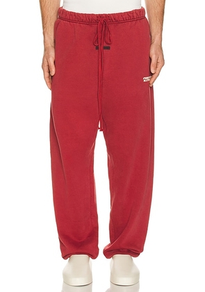 Fear of God ESSENTIALS Classic Sweatpant in Crimson - Red. Size L (also in M, S, XL/1X, XS, XXL/2X).
