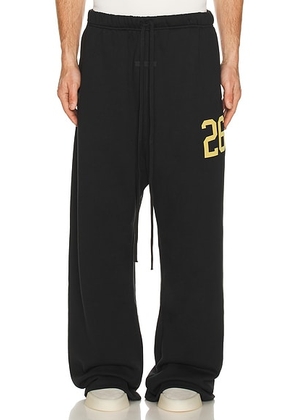 Fear of God ESSENTIALS Lounge Sweatpant in Vintage Black - Black. Size L (also in M, XL/1X, XXL/2X).