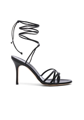 Manolo Blahnik Leva 105 Leather Sandal in Black in Black Nappa - Black. Size 35.5 (also in 35, 36, 36.5, 37, 37.5, 38, 38.5, 39, 40, 42).