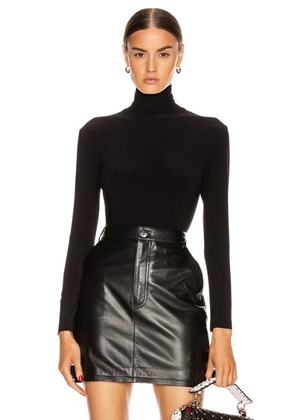 Norma Kamali Long Sleeve Turtleneck Bodysuit in Black - Black. Size L (also in M, XL).
