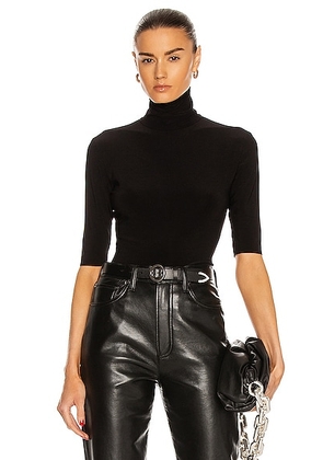 Norma Kamali Slim Fit Short Sleeve Turtleneck Top in Black - Black. Size L (also in M, S, XL, XS).