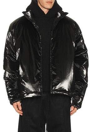Fear of God ESSENTIALS Puffer Jacket in Metallic Black - Black. Size L (also in M, S, XL/1X, XS, XXL/2X).