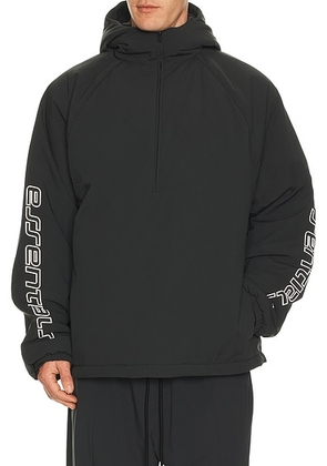 Fear of God ESSENTIALS Half Zip Anorak in Vintage Black - Black. Size L (also in M, S, XL/1X).
