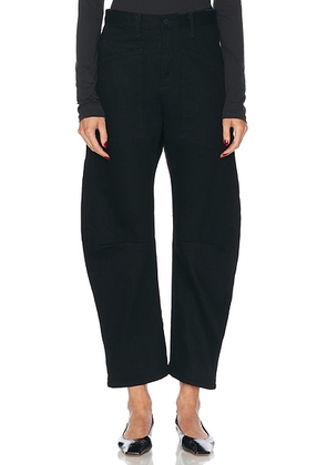 NILI LOTAN Shon Curved Leg in Black in Distressed Black - Black. Size 27 (also in ).