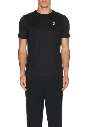 On Core-T in Black - Black. Size L (also in M, XL/1X).