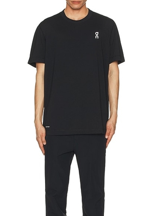 On Train-T in Black - Black. Size L (also in M, S, XL/1X).