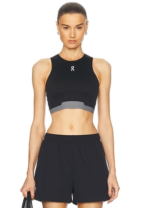 On Train 2 in 1 Crop Top in Black - Black. Size L (also in M, S, XS).