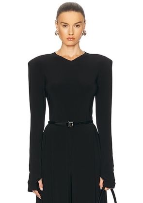 Norma Kamali Long Sleeve Shoulder Pad V Neck Top in Black - Black. Size L (also in M, S, XS).