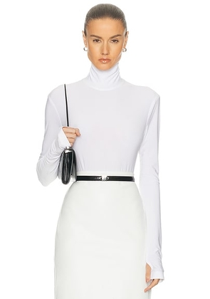 Norma Kamali Long Sleeve Turtleneck Bodysuit in Snow White - White. Size L (also in M, S, XL, XS).