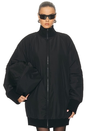 Norma Kamali Oversized Turtleneck Bomber Jacket in Black - Black. Size L (also in M, S, XS).