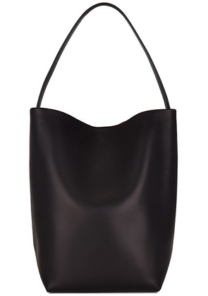The Row Large N/S Park Tote Bag in Black - Black. Size all.
