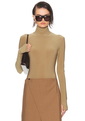 Norma Kamali Long Sleeve Turtleneck Bodysuit in Camel - Brown. Size L (also in M, S, XL, XS).
