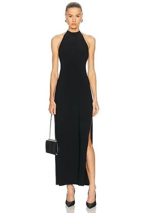 Norma Kamali Halter Side Slit Long Dress in Black - Black. Size L (also in M, S, XL, XS).