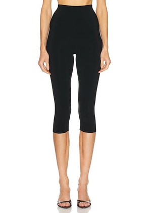 Norma Kamali Pedal Pusher Capri Legging in Black - Black. Size L (also in M, S, XL, XS).