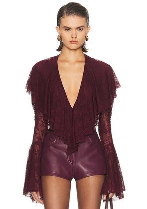 Norma Kamali Long Sleeve Deep V Ruffle Bodysuit in Plum - Burgundy. Size L (also in M, S, XL, XS).