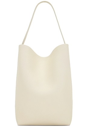 The Row Large N/S Park Tote Bag in Ivory - Cream. Size all.