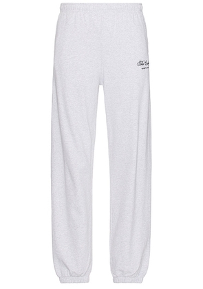 Sporty & Rich x Hotel Carlyle Script Sweatpant in Heather Gray - Light Grey. Size XL/1X (also in ).
