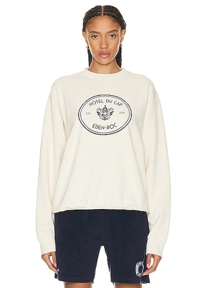 Sporty & Rich x Hotel Du Cap Eden Roc Eden Crest Crewneck Sweater in Cream - Cream. Size L (also in S, XS).