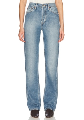 RE/DONE 90s High Rise Loose Jeans in Mid Fade - Blue. Size 23 (also in 28, 31).