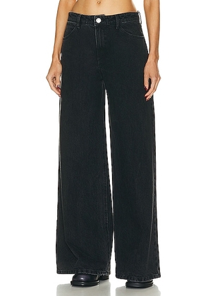 SPRWMN Wide Leg Tapered Jeans in Jones - Black. Size 28 (also in ).