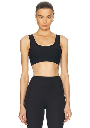 THE UPSIDE Peached Harley Sports Bra in Black - Black. Size L (also in M, S, XS).