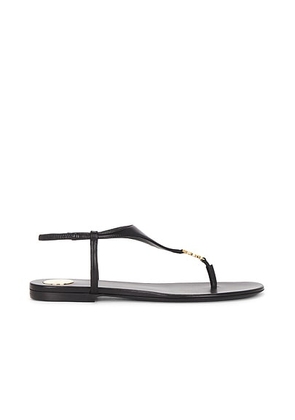 Saint Laurent Cassandra Flat Sandal in Nero - Black. Size 36 (also in 36.5, 37, 37.5, 38, 38.5, 39.5, 40, 41).