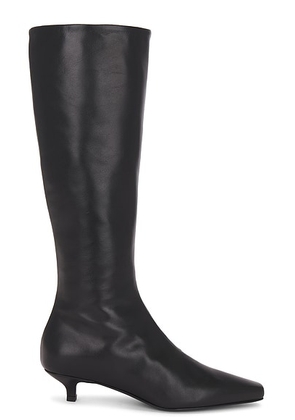 Toteme The Slim Knee High Boot in Black - Black. Size 39 (also in 38).