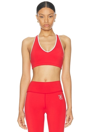 Sporty & Rich Runner Box V-Neck Sports Bra in Sports Red - Red. Size XS (also in ).