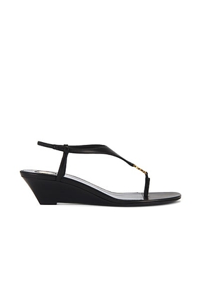 Saint Laurent Bridget Wedge Sandal in Nero - Black. Size 37.5 (also in 36.5, 38.5, 39, 39.5, 40, 41).
